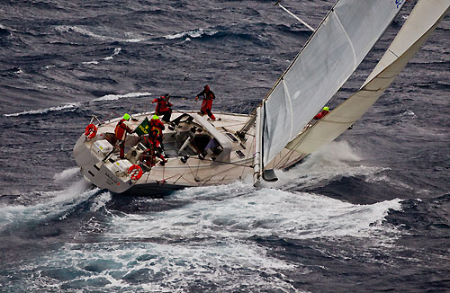 Tony and Rob Fisher's Adams 20 and Tasmanian entry Helsal III, ploughing through the conditions of the Tasman Sea off the New South Wales South Coast, during the Rolex Sydney Hobart Yacht Race 2010, Australia. Photo copyright Carlo Borlenghi, Rolex.