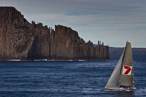 Line Honours Winner Wild Oats XI passing the Tasmania Peninsula's iconic Organ Pipes, during the Rolex Sydney Hobart Yacht Race 2010, Australia. Photo copyright Carlo Borlenghi, Rolex.