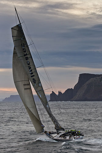 Sean Langman's 100-foot Elliott Investec Loyal, approaching Tasman Island during the Rolex Sydney Hobart 2010. Photo copyright Carlo Borlenghi, Rolex.