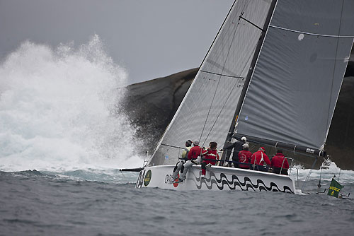 Roberto Luiz M.P E Souza's Soto 40 Carioca (BRA4), during the Rolex Ilhabela Sailing Week 2011. Carioca (BRA4) manobra diante do cost&atilde;o da ilha Alcatrazes. Photo copyright Rolex and Carlo Borlenghi.