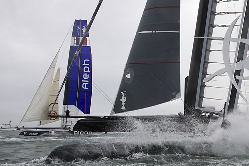 Terry Hutchinson's Artemis Racing with Bertrand Pacé's Aleph in the background at the America's Cup World Series, Plymouth, UK, September 10-18, 2011. Photo copyright Morris Adant.