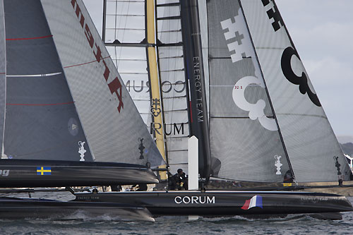 Lo�ck Peyron's Energy Team ahead of Terry Hutchinson's Artemis Racing at the America's Cup World Series, Plymouth, UK, September 10-18, 2011. Photo copyright Morris Adant.